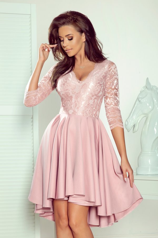 A pink dress with a lace bodice and three-quarter sleeves, featuring a flowing, asymmetrical skirt. The elegant design is perfect for formal occasions or special events.