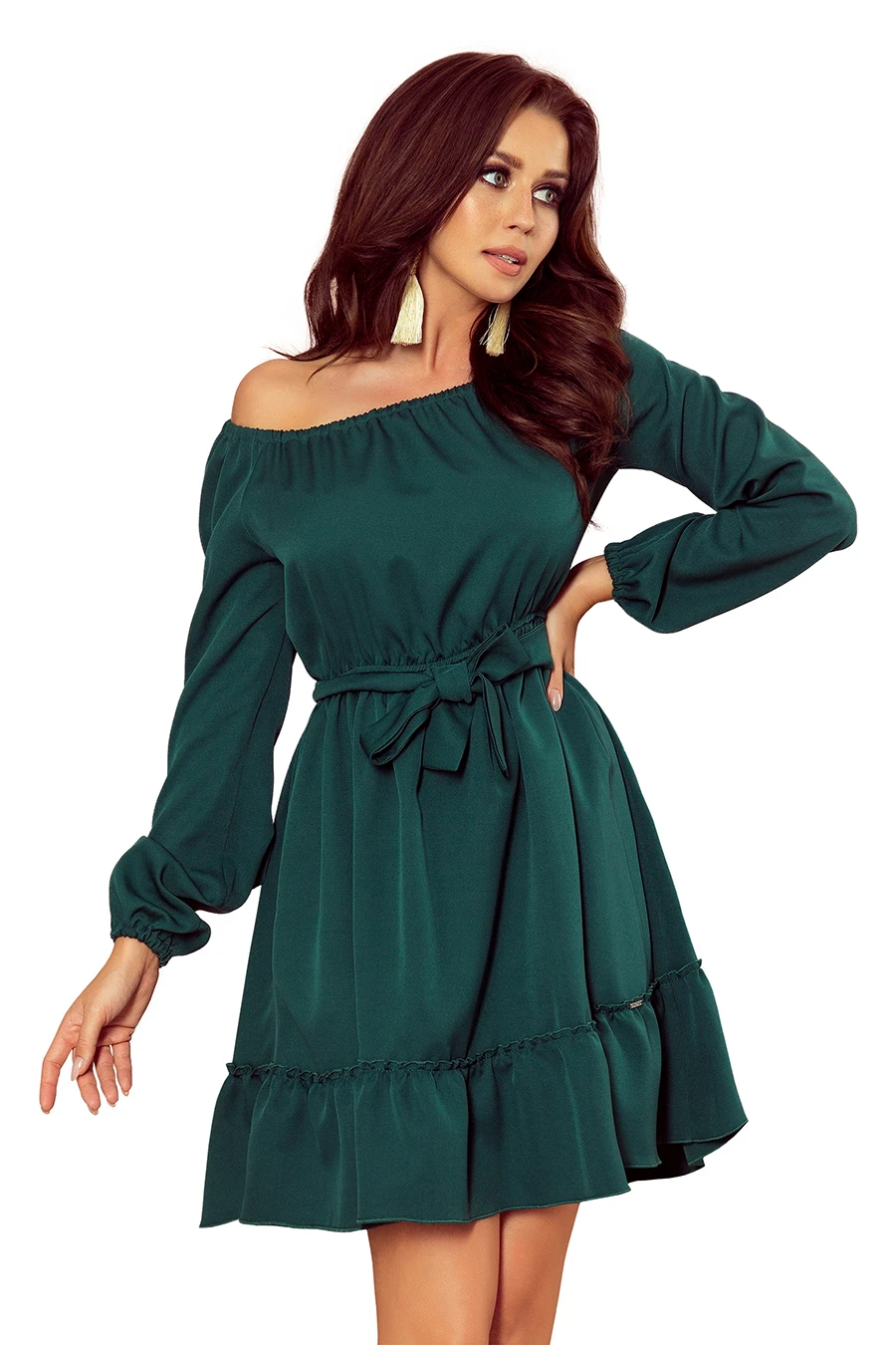 A stylish off-the-shoulder green dress features long sleeves and a flattering waist tie. The dress is elegantly designed with a ruffled hem, perfect for both casual and formal occasions.
