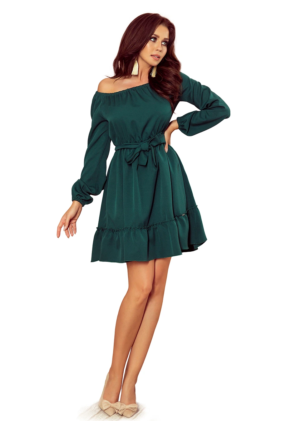 The image features a stylish off-the-shoulder green dress with long sleeves and a ruffled hem. The dress is cinched at the waist with a matching fabric belt, creating an elegant silhouette.