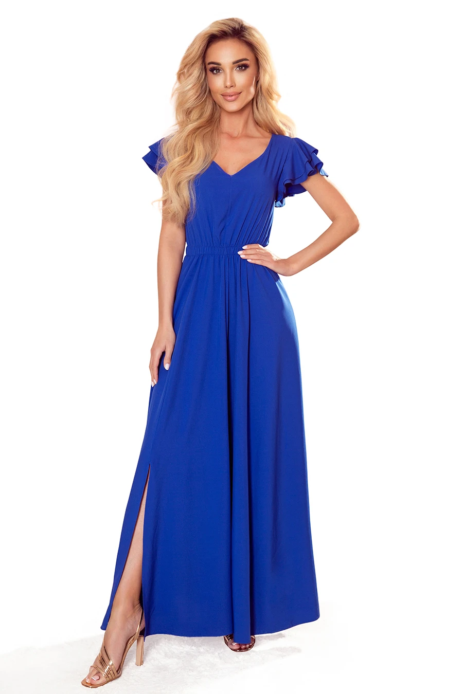 A vibrant blue maxi dress features elegant ruffled sleeves and a flattering V-neckline. The dress is complemented by a stylish side slit, adding a touch of sophistication.