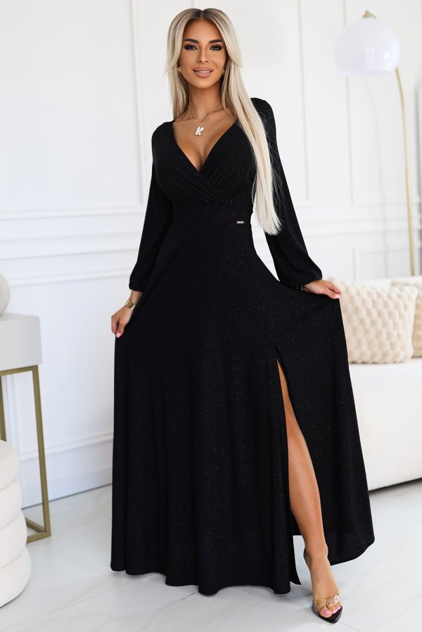 A long, elegant black dress with a subtle shimmer and a stylish side slit. The dress features a flattering V-neckline and long sleeves, perfect for formal occasions.
