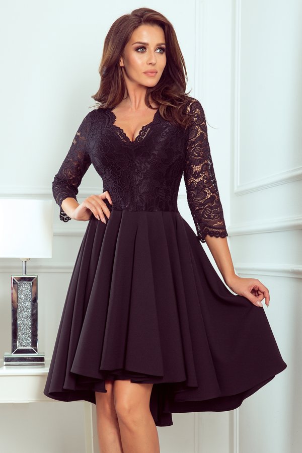 A stylish black dress features a lace bodice with three-quarter sleeves and a flared skirt. The elegant design is perfect for formal occasions, offering a sophisticated and timeless look.